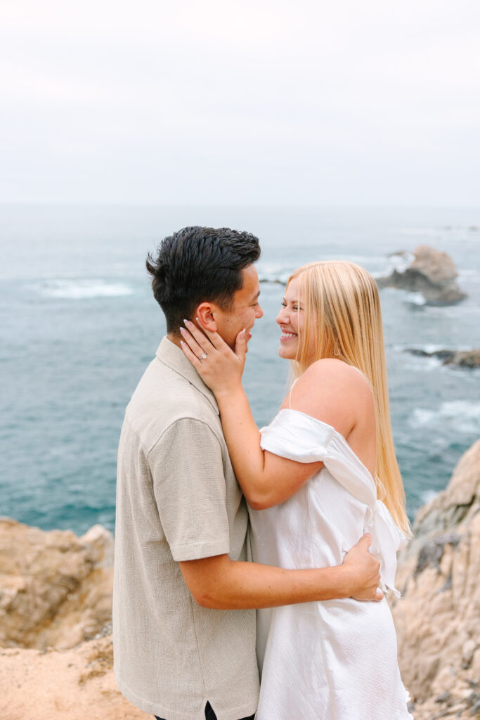 joyful couple on the beach