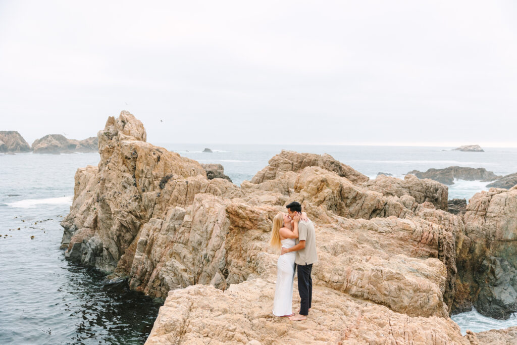 couple happily hugging during their big sur engagement session