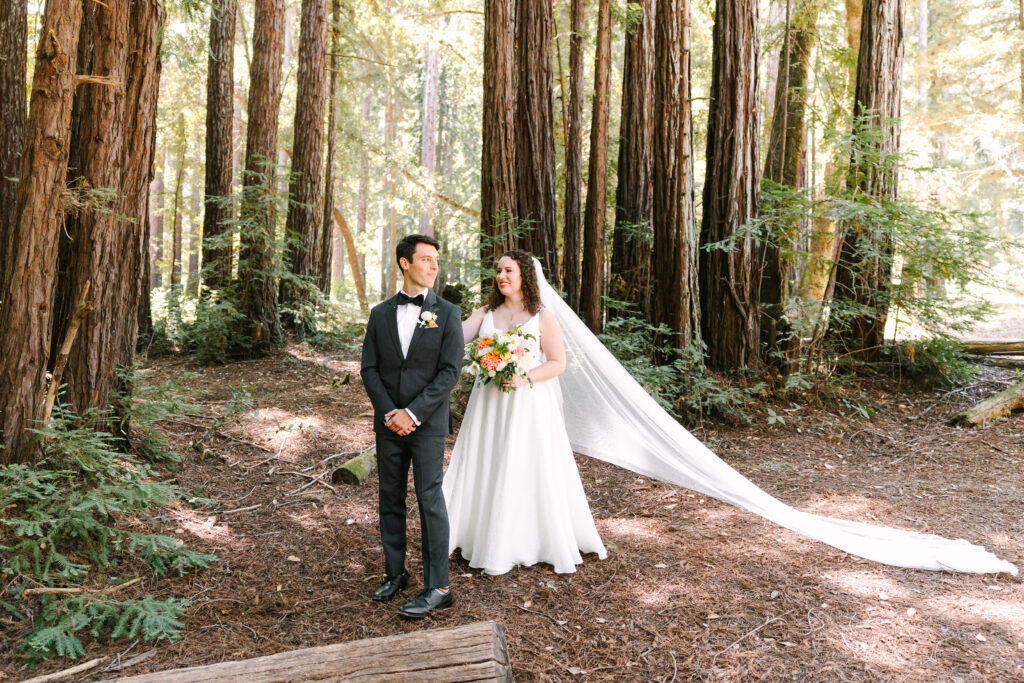 Bride and groom first look in the redwood trees at YMCA CAMP CAMPBELL